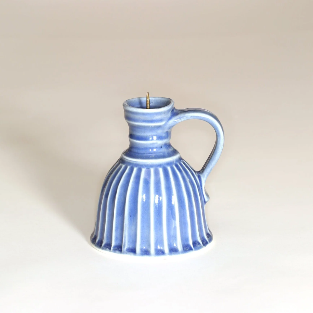 blue and white candle holder with handle 