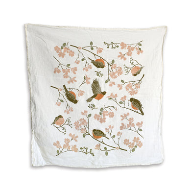 tea towel with birds and flower branches on white background
