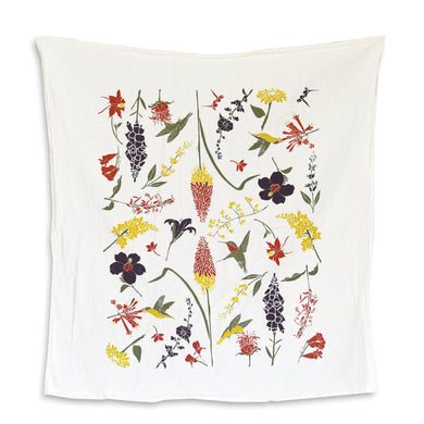 Tea towel with humming birds and garden flower design on white background