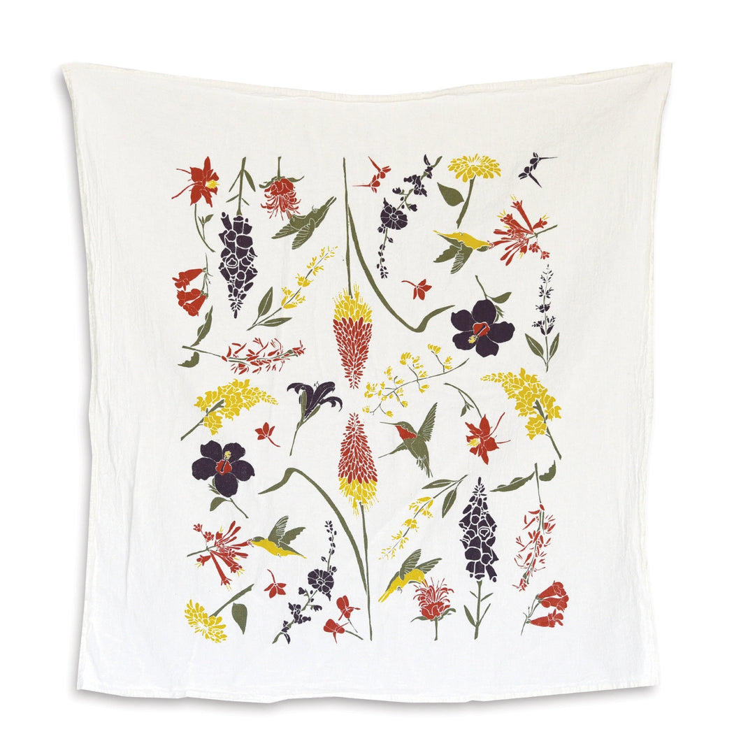 Tea towel with humming birds and garden flower design on white background