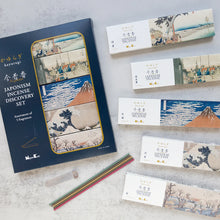 Japanese incense discovery set with packaging and sticks on a light gray background