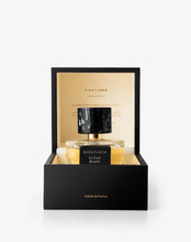 Eightabor Le Gant Blanc extrait de parfum in a black presentation box with a gold interior, featuring a rectangular glass bottle with a black marble-patterned cap.
