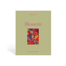 Puzzle box titled 'Blossom' with a colorful floral design on a beige background