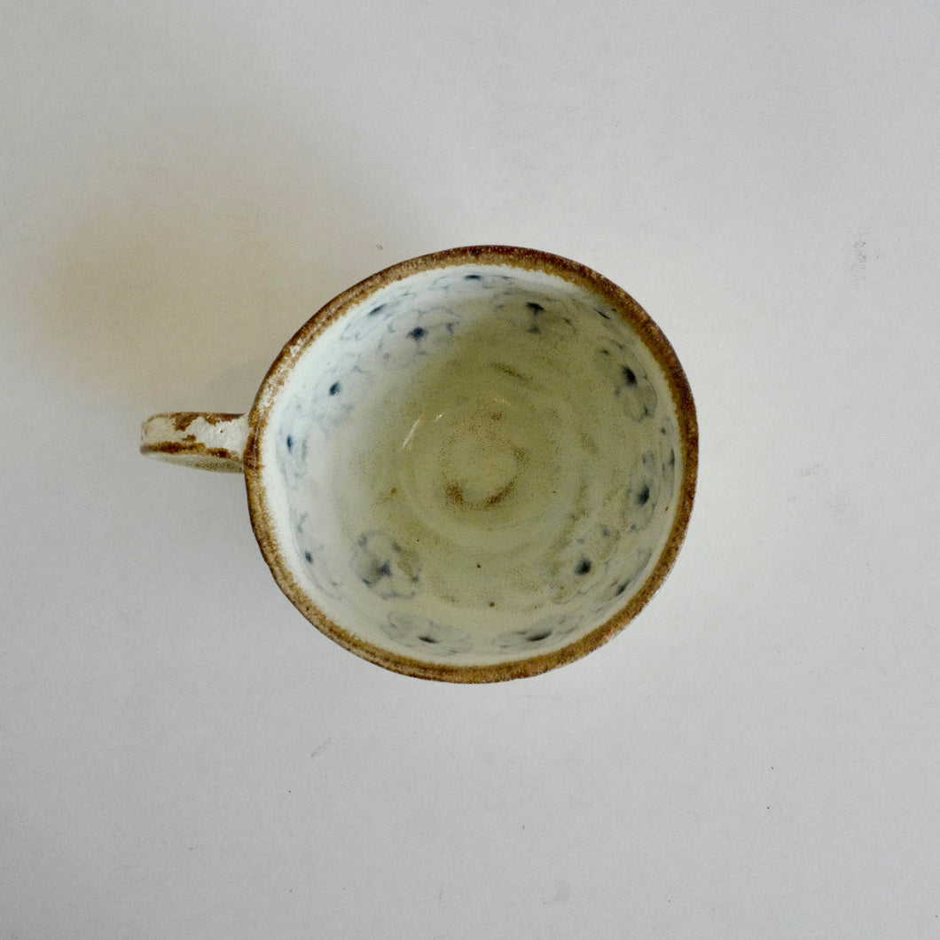 multi blue flower pattern in cappuccino cup