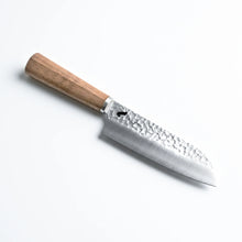 Taski Knife with a wooden handle on a white background