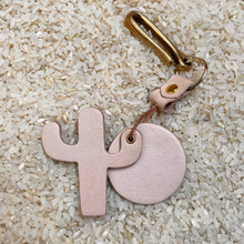 Key Fob (Key Hook) Nude in nude color leather. Leather in cactus and sun shapes.