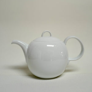 A glossy Hakusan Porcelain Hakuji Mayu porcelain Tea Pot in plain background. 