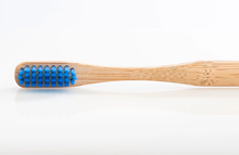 Ocean Conservation Bamboo Toothbrush on bamboo handle. Blue bristles. 