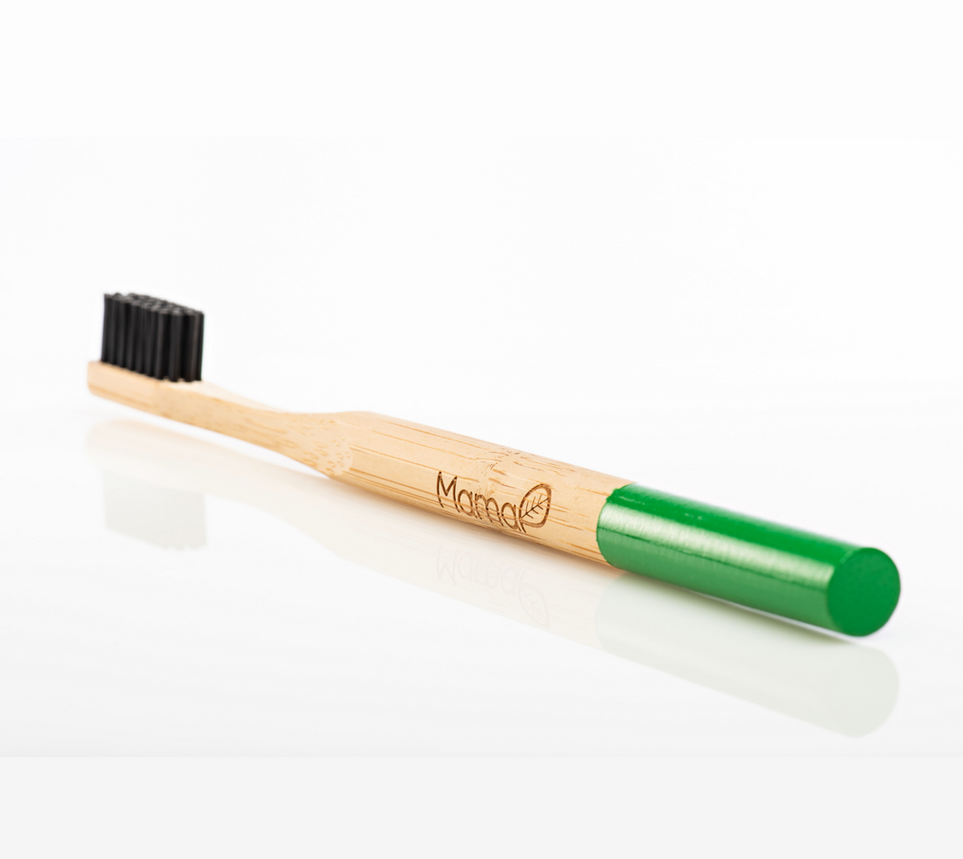 Mental Health Bamboo Toothbrush. Color green at the end of the toothbrush handle. Black bristles. 