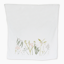 June and December Healing white tea Towel printed with field flowers. 