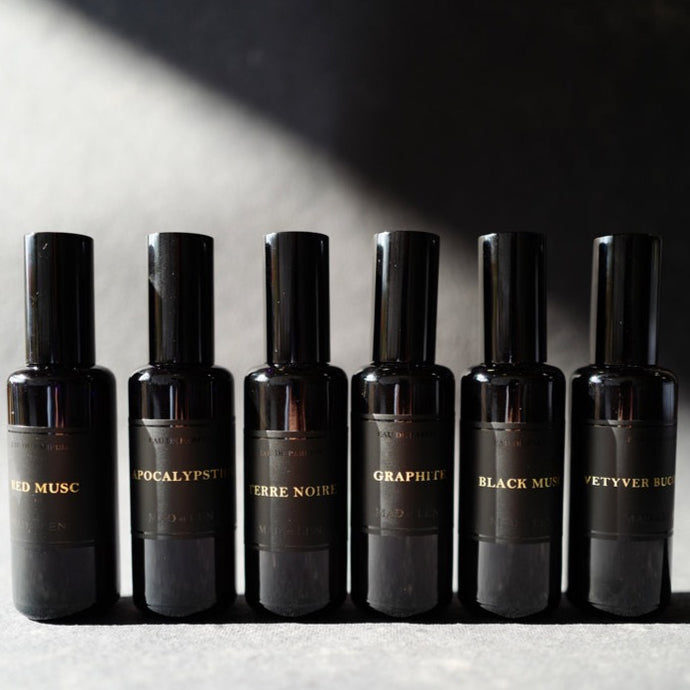 A collection of six Mad et Len Eau de Parfum bottles. 