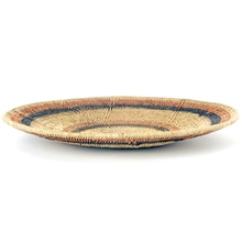 Makenge Root Wedding Baskets - Peach and Black Rings on a flat surface. 