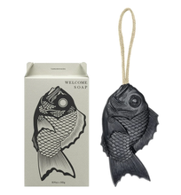 Welcome Soap - Muscovado of a black fish soap on a rope. black and white back packaging 