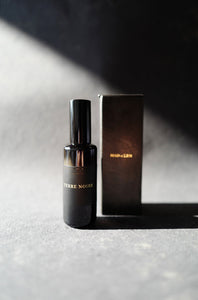 Mad et Len Eau de Parfum - Terre Noire with Black Metal housing, gold appliqué on packaging. 